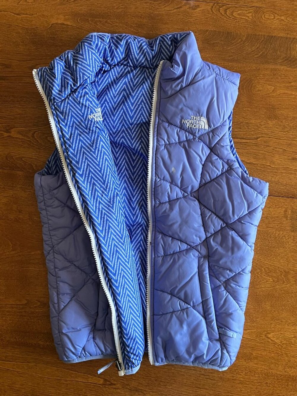 The North Face reversible periwinkle puffer vest M 10/12